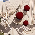 Wedding Photo Check In Spot With White Curtain Backdrop Red Balls And Green Plants