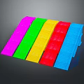 Colorful Step Shaped Objects in Pink Green Yellow Red Blue Colors on Dark Background