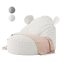 White Plush Bean Bag Chair With Ear Shaped Design And Pink Striped Fringed Blanket