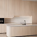Modern Light Wood Kitchen Interior With Sleek Island Counter And Oven Cabinets