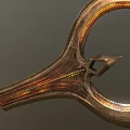 Golden and Red Glowing Weapon with Intricate Curved Metallic Decorative Patterns
