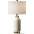 Elegant White Ceramic Table Lamp With Cream Fabric Lampshade And Gold Metal Fitting
