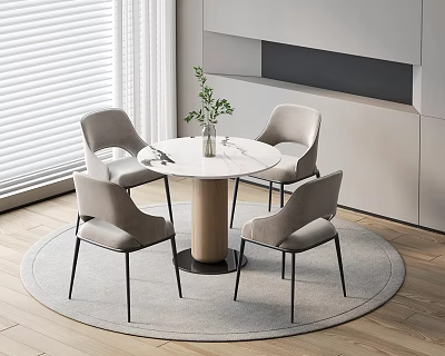Modern Round Table With Four Light Gray Chairs And Green Plant In Indoor Setting 3d model