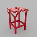 Stylish Red Single Chair Featuring Modern Crossed Structural Frame Design