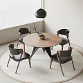 Round Wooden Dining Table Set With Four Black Chairs Wooden Legs And Decorative Ornament