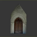 Gothic Style Stone Entrance Structure With Pointed Roof And Arched Wooden Door