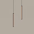 Modern Pendant Lights with Elongated Sleek Design White Light Illumination in Minimalist Interior Setting
