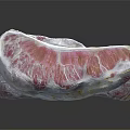 Sliced Grapefruit with Pink Flesh and White Pink Rind on Black Surface