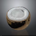 Halved Coconut With White Flesh And Brown Outer Shell On Dark Surface