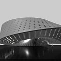 Cultural Center Building With Metallic Perforated Surface And Curved Design