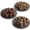 Decorative Ornament Set With Three Black Plates Holding Various Nuts 3d model
