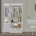 Organized Clothes Wardrobe With Hanging Shirts Coats And Folded Storage Items