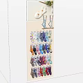 Vertical Display Rack With Various Colored Socks Under Cloudy Blue Sky