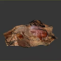 Orange Textured Surface Sculpture With Irregular Shape And Hollow Section On Dark Background