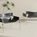 Modern Minimalist Black Leather Single Sofa With Sleek Stainless Steel Frame For Living Room Decor