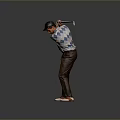 Man In Argyle Sweater Swinging Golf Club With Brown Pants And Cap