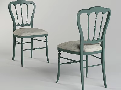 Elegant Green Dining Chairs With Carved Backrests And Light Colored Seat Cushions 3d model
