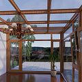 Black Frame Glass Sunroom With Wooden Roof And Indoor Plants On Patio