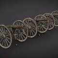 Antique Weapons Old Fashioned Cannons with Large Wooden Wheels Lined Up on Dark Background
