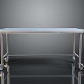 Modern Stainless Steel Dining Table With Long Sleek Surface And Wheels On Reflective Floor