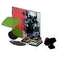 Decorative Ornament Set With Abstract Painting Green Fan Purple Vase Stacked Books And Black Sculpture