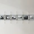 Metal Wall Photo Frames with Black and White Architectural Photos Neatly Arranged