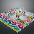Vibrant Floral Tea Set With Teapot And Teacups On Colorful Mat