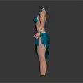 Woman in Blue Bikini Top and Wrapped Skirt with Arms Outstretched