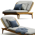 Comfortable Lounge Chair With Wooden Frame Rattan Backrest Gray Cushion Blue Pillow And Gray Blanket