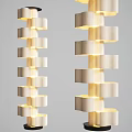 Modern Stacked Floor Lamps With Light Colored Fabric Shades And Black Base