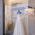 Elegant Bridal Window Display with Soulful Wedding Dress and Fresh Flower Bouquet