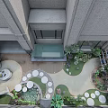 Courtyard Garden Featuring Two White Rabbit Sculptures Green Plants Wooden Shelf and Outdoor Table Chairs