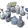 Blue and White Patterned Ceramic Vessels Collection With Vases Jars and Bowls