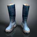 Blue Rain Boots With Worn Design And Mud On Soles On Dark Background