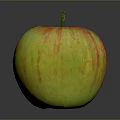 Shiny Red And Yellow Striped Apple With Green Stem On Grey Background