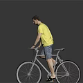 Man in yellow T-shirt and shorts riding a bicycle against gray background