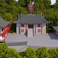 Traditional Chinese Ancient Building With Curved Grey Roofs Red Pillars And Lush Green Trees
