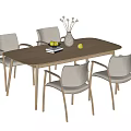Wooden Dining Table Set With Four Light Gray Armchairs Vase Flowers Books And Fruits