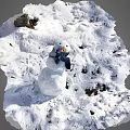 Outdoor Winter Snowman With Carrot Nose And Scarf On Snowy Ground