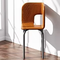 Stylish Oak Wood Single Chair With Black Metal Legs In Sunlit Room