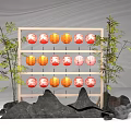Traditional Bamboo Frame Displaying Red And Orange Round Lanterns With Bamboo Plants And Rocks