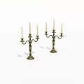 Elegant Brass Candelabra Pair With Three Candles Each And Ornate Bases