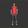 Man Wearing Red Vest Grey Capri Pants White Sneakers with Hands in Pockets
