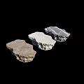 Three Stone Shaped Coffee Tables With Different Colors For Natural Living Space