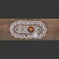 Rustic Long Wooden Table With White Lace Tablecloth And Orange Cup