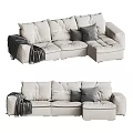 Modern Beige Sectional Sofa With Plush Pillows And Cozy Throw Blanket 3d model