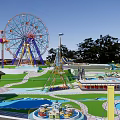 Colorful Kids Playground With Slides Swings Climbing Structures And Water Features