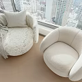 Modern Upholstered Single Sofa With Throw Pillow And Blanket By Large Window City View