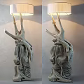 Natural Branch Design Floor Lamp With Carved Base And Light Colored Shade