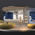Modern Exhibition Booth With Circular Design White Interior Yellow And Orange Sofa Seats And Lighting